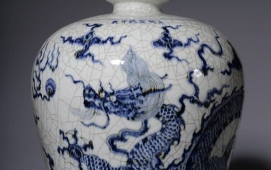 Blue and white glazed plum vase with red dragon pattern, made in the Xuande year of the Ming Dynasty