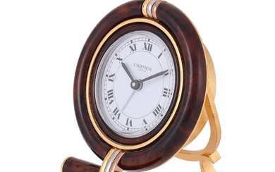 CARTIER, REF. 7522, A BRASS AND BROWN LACQUER TRAVEL ALARM DESK CLOCK
