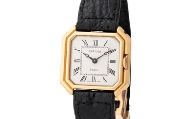 Cartier Paris. Special Ceinture Octagonal-Shaped Wristwatch in Yellow Gold, With Enameled Roman Numbers Dial.