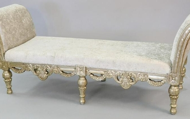 Carved and embossed silver gilt bench, highly carved in