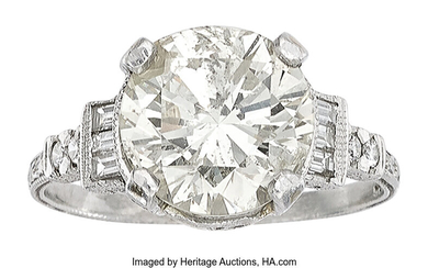 Diamond, Platinum Ring Stones: Round brilliant-cut diamond weighing 4.55...