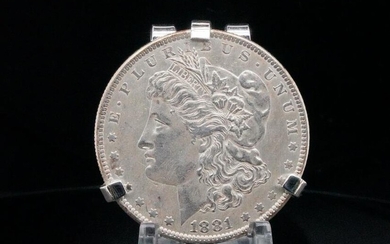 Elvis Presley's 1881 Morgan Silver Dollar Money Clip
