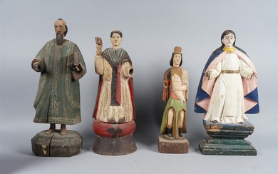 FOUR COLONIAL POLYCHROMED WOOD FIGURES OF SAINTS