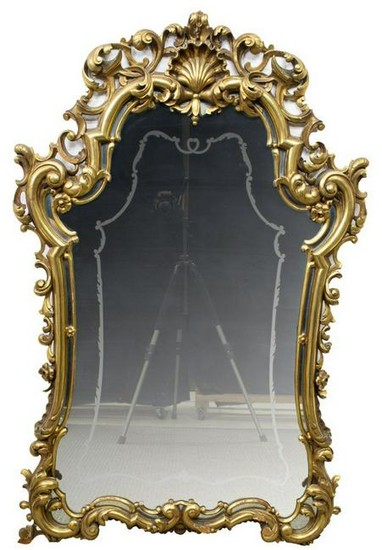 FRENCH LOUIS XV STYLE SHAPED GILT WOOD MIRROR