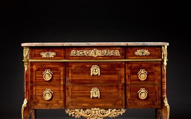 From Versailles: A Louis XVI amaranth and bois satiné commode...