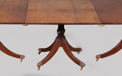 GEORGE III STYLE MAHOGANY THREE-PEDESTAL DINING TABLE, 19TH CENTURY 29 1/2 x 48 x 111 in. (74.9 x 121.9 x 281.9 cm.)