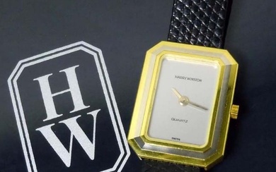 HARRY WINSTON 18KT YELLOW GOLD DRESS WATCH, MODEL 14474 Ser. No.75, featuring a Swiss quartz
