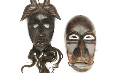 Ivory Coast, Dan, two masks;