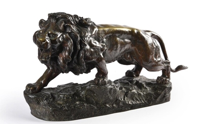 Joseph Descomps (1872-1948 French) A bronze model of a lion rampant