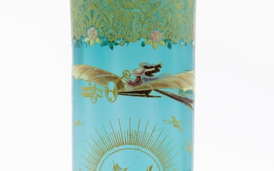 LEGRAS Vase rouleau en verre teinté turquoise à décor stylisé peint à l'or et émaillé...