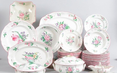 LUNEVILLE, KELLER & GUERIN Fine earthenware dinner service decorated with tulips and polychrome flowers, including: 36 dinner plates, 18 soup plates, 24 dessert plates, 2 round dishes, 2 oval dishes, a square bowl, two vegetable dishes, a tray sauce...