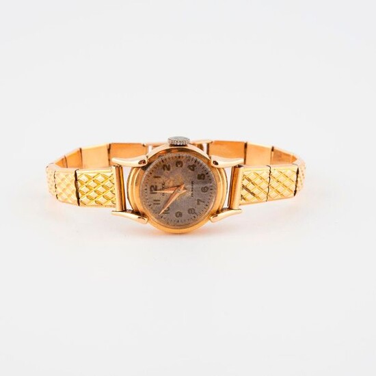 Lady's bracelet watch in yellow gold (750)