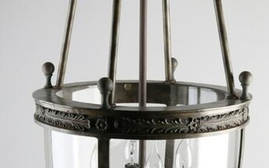 Large brass patinated lantern-shaped four-bulb hanging