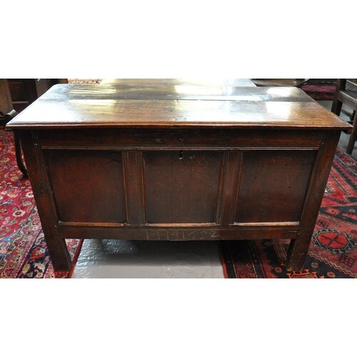 Late 17th century oak coffer, the moulded top above three fi...