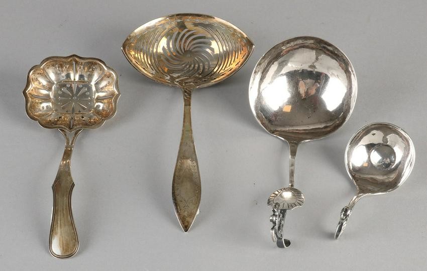 Lot four silver spoons, 833/000, an antique spoon