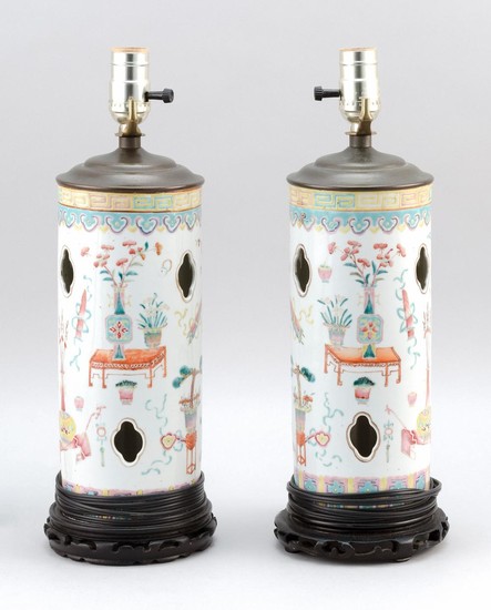 PAIR OF CHINESE FAMILLE ROSE PORCELAIN HAT STANDS Decorated with scholar's objects, vases and jardinières. Heights 11". Mounted as t..