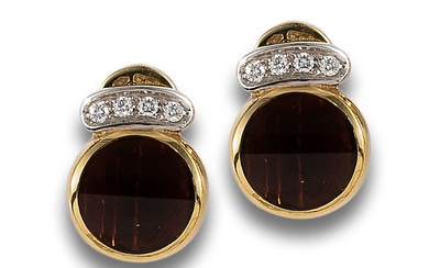 POMELLATO EARRINGS WITH DIAMONDS AND GARNETS, IN YELLOW GOLD