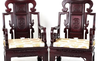 Pair of Chinese carved hardwood throne chairs with lift of c...