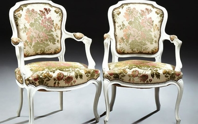 Pair of French Louis XV Style Carved Beech Fauteuils