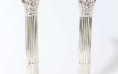 Pair of George V silver Corinthian column candlesticks (London 1914), maker Goldsmiths & Silversmiths Company