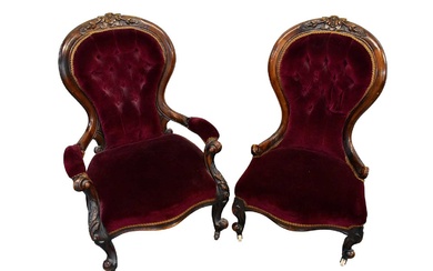 Pair of mid Victorian his and hers upholstered easy chairs