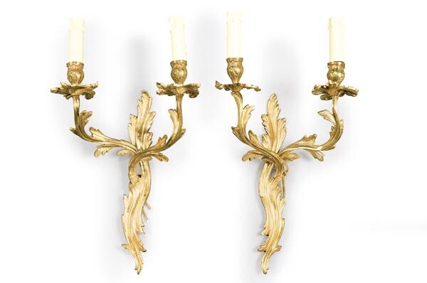 Pair of rococo style gilt bronze wall lights, France