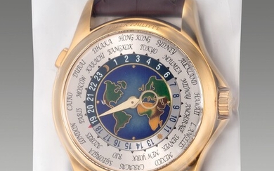 Patek Philippe, Ref. 5131J-001 A very fine yellow gold world time wristwatch with cloisonné enamel dial with Certificate of Origin and presentation box, single sealed