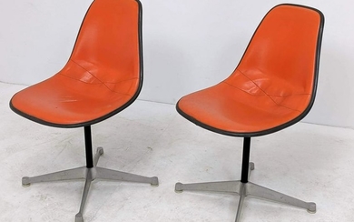 Pr HERMAN MILLER Swivel Chairs. Orange vinyl covered fi