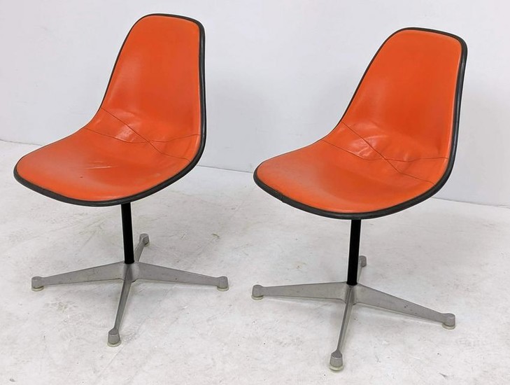 Pr HERMAN MILLER Swivel Chairs. Orange vinyl covered fi