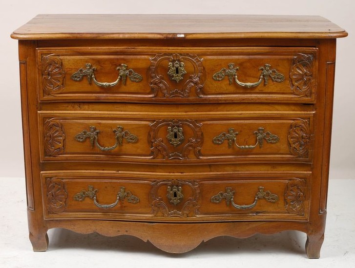 Regency style "Arbalète" chest of drawers in carved...