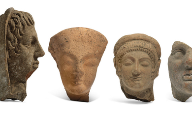 THREE ETRUSCAN TERRACOTTA VOTIVE HEADS AND AN ANTEFIX, CIRCA 6TH-3RD CENTURY B.C.