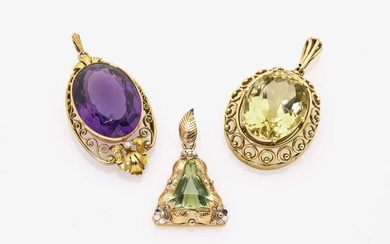 Three pendants with each a different coloured stone