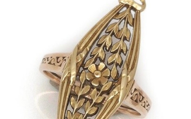 Openwork yellow gold "Navette" ring, decorated with flowers and foliage, finished with a trilobal motif. The openwork ring is decorated with foliage. Finger size : 54. Gross weight : 6.7 g.