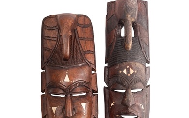 Two African carved hardwood and bone inset masks, 20th centu...