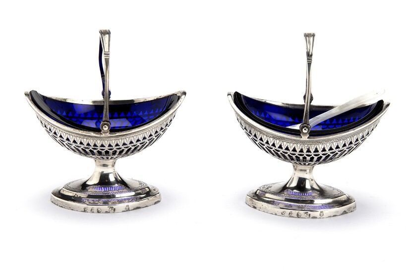 Two Dutch silver salt cellars with blue glass liners., The Hague