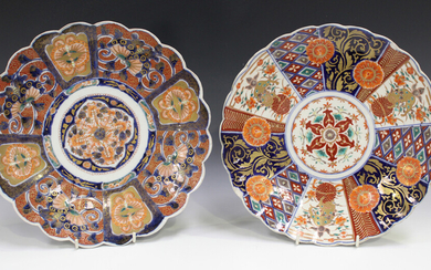 Two Japanese Imari porcelain circular dishes, Meiji period, one with panels of moths and butterflies