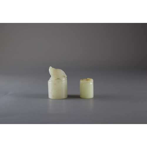 Two celadon Jade Seals, Qing Dynasty or laterthe tallest H: ...