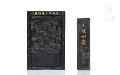 Two ink plaques with gilded inscriptions, 20th century