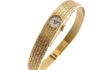 UNIVERSAL Geneve MONTRE bracelet de dame en or jaune, mouvement mécanique. Pds brut: 42.9g, signé...