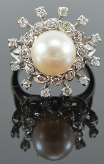 White gold, pearl and diamond mounted cluster ring.