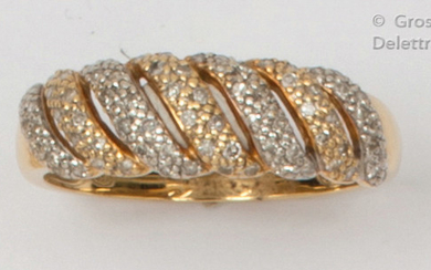 Yellow and white gold ring, set with openwork...