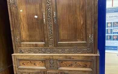 17th cent. Style oak cupboard with foliate carved stiles...