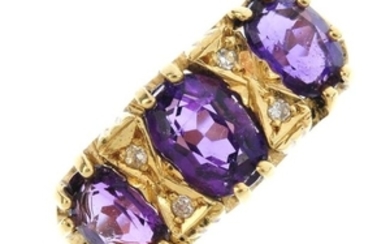 An 18ct gold amethyst and diamond dress ring. The