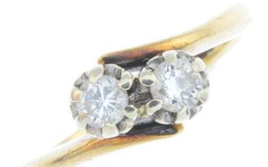 A 9ct gold diamond two-stone ring.