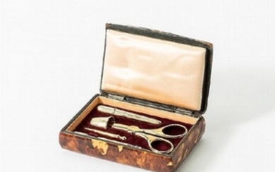 An antique four-piece 14 carat gold sewing set in tortoiseshell case and a 14 carat gold thimble
