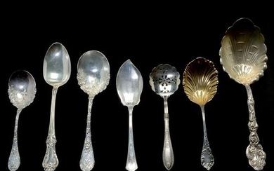Assortment of Silver Serving Pieces and Flatware.