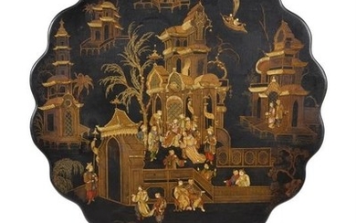 A black lacquer and chinoiserie decorated tripod table
