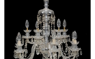 A pair of Continental moulded and cut glass twelve light chandeliers in late 18th century taste