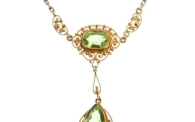 An early 20th century gold peridot necklace. The