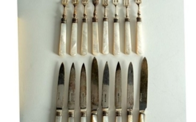 Eight pairs of silver dessert knives and forks, various